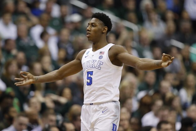Duke forward RJ Barrett (5) reacts after scoring against Michigan State during the first half of an NCAA men's East Regional final college basketball game in Washington, Sunday, March 31, 2019. (AP Photo/Alex Brandon)