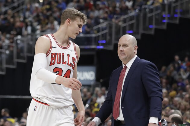 Chicago Bulls head coach Jim Boylen talks with Lauri Markkanen during the second half of an NBA basketball game against the Indiana Pacers, Tuesday, Dec. 4, 2018, in Indianapolis. Indiana won 96-90. (AP Photo/Darron Cummings)