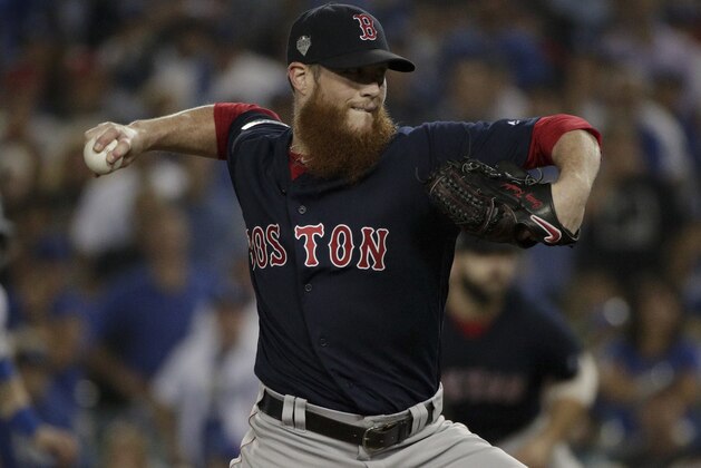 Boston Red Sox relief pitcher Craig Kimbrel throws against the Los Angeles Dodgers during the ninth inning in Game 3 of the World Series baseball game on Friday, Oct. 26, 2018, in Los Angeles. (AP Photo/Jae C. Hong)