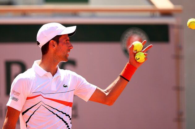 PARIS, FRANCE - JUNE 01: Novak Djokovic of Serbia catches a ball during his mens singles third round match against Salvatore Caruso of Italy during Day seven of the 2019 French Open at Roland Garros on June 01, 2019 in Paris, France. (Photo by Clive Brunskill/Getty Images)