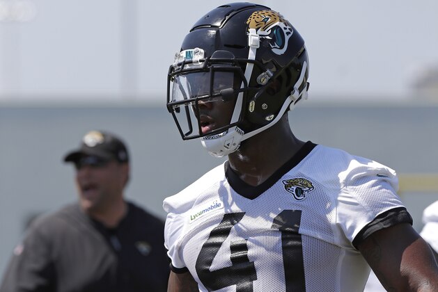 Jacksonville Jaguars defensive end Josh Allen prepares for drills during an NFL football practice, Tuesday, May 21, 2019, in Jacksonville, Fla. (AP Photo/John Raoux)