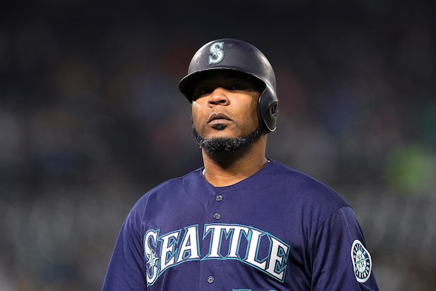 OAKLAND, CA - MAY 24:  Edwin Encarnacion #10 of the Seattle Mariners walks back to the dugout after flying out against the Oakland Athletics in the top of the fourth inning of a Major League Baseball game at Oakland-Alameda County Coliseum on May 24, 2019 in Oakland, California.  (Photo by Thearon W. Henderson/Getty Images)