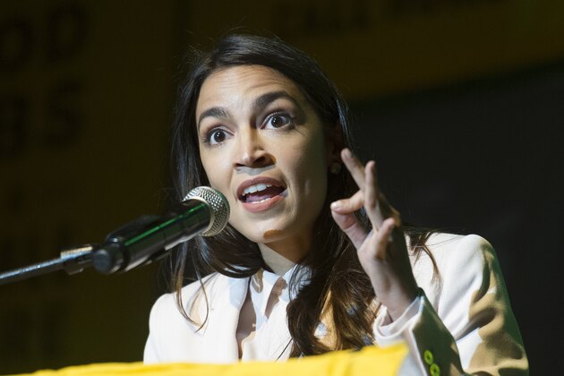 Rep. Alexandra Ocasio-Cortez, D-N.Y., addresses The Road to the Green New Deal Tour final event at Howard University in Washington, Monday, May 13, 2019. (AP Photo/Cliff Owen)