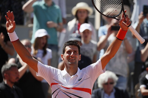 Serbia's Novak Djokovic celebrates winning his third round match of the French Open tennis tournament against Italy's Salvatore Caruso in three sets, 6-3, 6-3, 6-2, at the Roland Garros stadium in Paris, Saturday, June 1, 2019. (AP Photo/Christophe Ena)