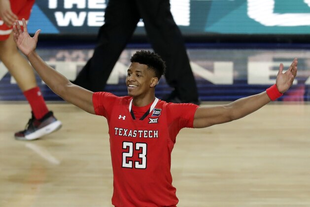 Texas Tech's Jarrett Culver (23) celebrates after defeating Michigan State 61-51 in the second half in the semifinals of the Final Four NCAA college basketball tournament, Saturday, April 6, 2019, in Minneapolis. (AP Photo/Matt York)