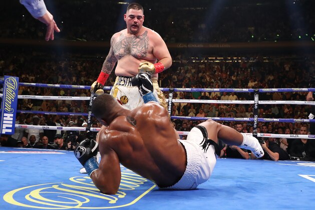 NEW YORK, NEW YORK - JUNE 01:  Andy Ruiz Jr knocks down Anthony Joshua in the first round during their IBF/WBA/WBO heavyweight title fight at Madison Square Garden on June 01, 2019 in New York City. (Photo by Al Bello/Getty Images)