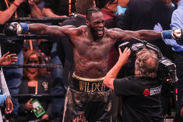NEW YORK, NEW YORK - MAY 18: Deontay Wilder screams at the camera after knocking out   Dominic Breazeale in the first round during their bout for Wilder's WBC heavyweight championship at Barclays Center on May 18, 2019 in New York City. (Photo by Anthony Geathers/Getty Images)