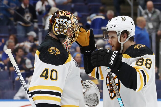 ST LOUIS, MISSOURI - JUNE 01:  Tuukka Rask #40 of the Boston Bruins and David Pastrnak #88 celebrate their 7-2 win over the St. Louis Blues in Game Three of the 2019 NHL Stanley Cup Final at Enterprise Center on June 01, 2019 in St Louis, Missouri. (Photo by Bruce Bennett/Getty Images)