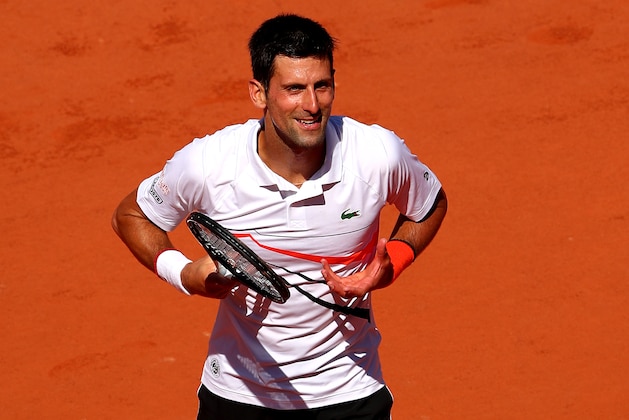 PARIS, FRANCE - JUNE 01: Novak Djokovic of Serbia celebrates victory during his mens singles third round match against Salvatore Caruso of Italy during Day seven of the 2019 French Open at Roland Garros on June 01, 2019 in Paris, France. (Photo by Clive Brunskill/Getty Images)