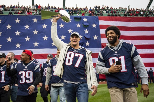 BOSTON, MA - APRIL 9: Rob Gronkowski #87 of the New England Patriots is introduced introduced with the Vince Lombardi trophy during the Boston Red Sox 2018 World Series championship ring ceremony before the Opening Day game against the Toronto Blue Jays on April 9, 2019 at Fenway Park in Boston, Massachusetts. (Photo by Billie Weiss/Boston Red Sox/Getty Images)