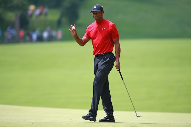 DUBLIN, OHIO - JUNE 02: Tiger Woods waves to the gallery after making a birdie putt on the second hole during the final round of The Memorial Tournament Presented by Nationwide at Muirfield Village Golf Club on June 02, 2019 in Dublin, Ohio. (Photo by Matt Sullivan/Getty Images)