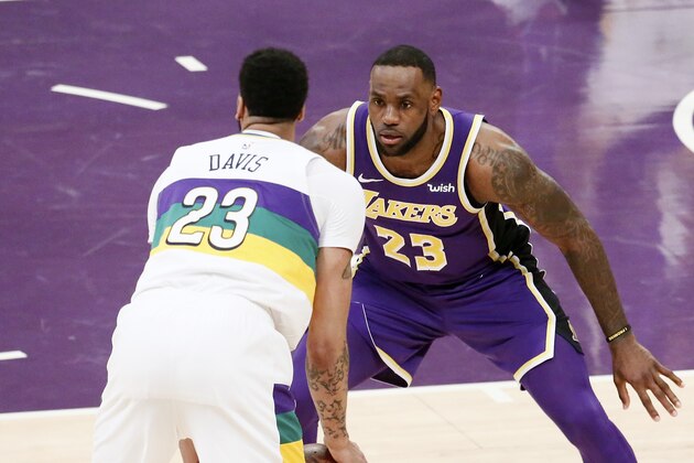 LOS ANGELES, CA - FEBRUARY 27: LeBron James #23 of the Los Angeles Lakers plays defense against Anthony Davis #23 of the New Orleans Pelicans on February 27, 2019 at STAPLES Center in Los Angeles, California. NOTE TO USER: User expressly acknowledges and agrees that, by downloading and/or using this Photograph, user is consenting to the terms and conditions of the Getty Images License Agreement. Mandatory Copyright Notice: Copyright 2019 NBAE (Photo by Chris Elise/NBAE via Getty Images)