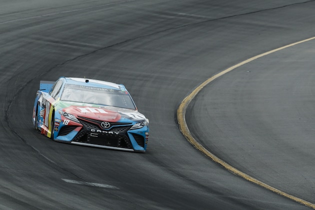 Kyle Busch enters Turn 1 during a NASCAR Cup Series auto race at Pocono Raceway, Sunday, June 2, 2019, in Long Pond, Pa. (AP Photo/Matt Slocum)