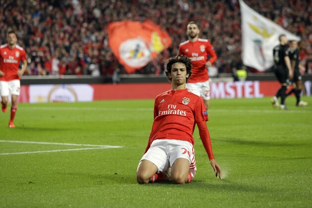 Benfica's Joao Felix celebrates after scoring his side's opening goal from the penalty spot during the Europa League quarterfinals, first leg, soccer match between Benfica and Eintracht Frankfurt at the Luz stadium in Lisbon, Thursday, April 11, 2019. (AP Photo/Armando Franca)