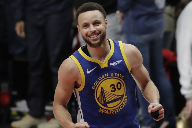 Golden State Warriors guard Stephen Curry reacts at the end of Game 4 of the NBA basketball playoffs Western Conference finals against the Portland Trail Blazers, Monday, May 20, 2019, in Portland, Ore. The Warriors won 119-117 in overtime. (AP Photo/Ted S. Warren)