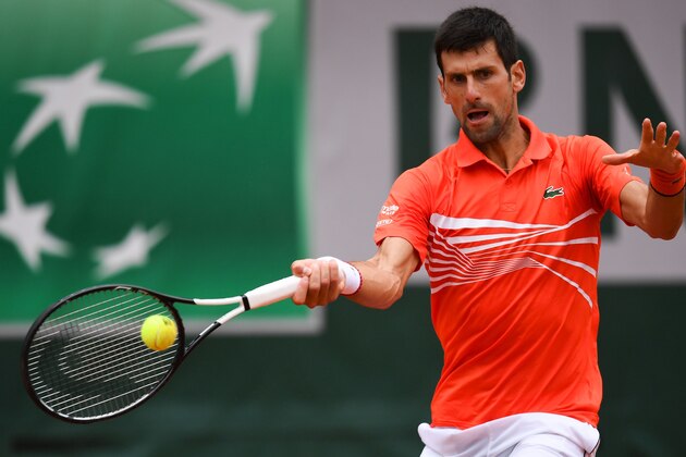 Serbia's Novak Djokovic returns the ball to Germany's Jan-Lennard Struff during their men's singles fourth round match on day nine of The Roland Garros 2019 French Open tennis tournament in Paris on June 3, 2019. (Photo by Christophe ARCHAMBAULT / AFP)        (Photo credit should read CHRISTOPHE ARCHAMBAULT/AFP/Getty Images)