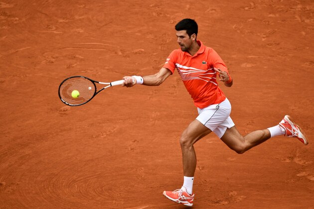 Serbia's Novak Djokovic returns the ball to Germany's Jan-Lennard Struff during their men's singles fourth round match on day nine of The Roland Garros 2019 French Open tennis tournament in Paris on June 3, 2019. (Photo by Philippe LOPEZ / AFP)        (Photo credit should read PHILIPPE LOPEZ/AFP/Getty Images)