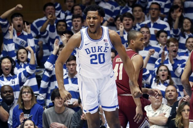 Duke's Marques Bolden (20) celebrates after he dunked against Boston College during the first half of an NCAA college basketball game in Durham, N.C., Tuesday, Feb. 5, 2019. (AP Photo/Chris Seward)