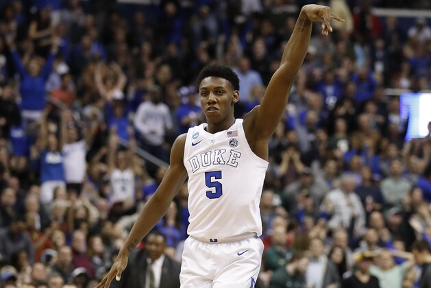 Duke forward RJ Barrett (5) reacts after scoring against Michigan State during the second half of an NCAA men's East Regional final college basketball game in Washington, Sunday, March 31, 2019. (AP Photo/Alex Brandon)