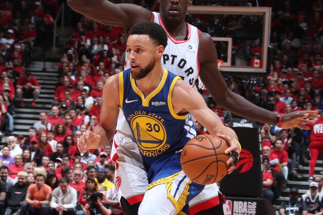 TORONTO, CANADA - JUNE 2: Stephen Curry #30 of the Golden State Warriors handles the ball against Pascal Siakam #43 of the Toronto Raptors during Game Two of the NBA Finals on June 2, 2019 at Scotiabank Arena in Toronto, Ontario, Canada. NOTE TO USER: User expressly acknowledges and agrees that, by downloading and/or using this photograph, user is consenting to the terms and conditions of the Getty Images License Agreement. Mandatory Copyright Notice: Copyright 2019 NBAE (Photo by Nathaniel S. Butler/NBAE via Getty Images)