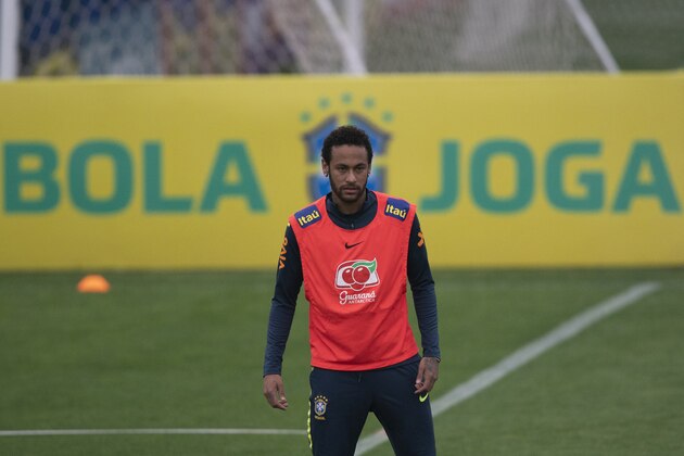 Brazil's soccer player Neymar attends a practice session at the Granja Comary training center ahead the Copa America tournament in Teresopolis, Brazil, Sunday, June 2, 2019. A Brazilian police document says an unidentified woman has accused soccer star Neymar of raping her in Paris last month. After the revelation, the player used Instagram to publish a 7-minute video that includes WhatsApp messages he says he exchanged with the accuser in a friendly way days later. (AP Photo/Leo Correa)