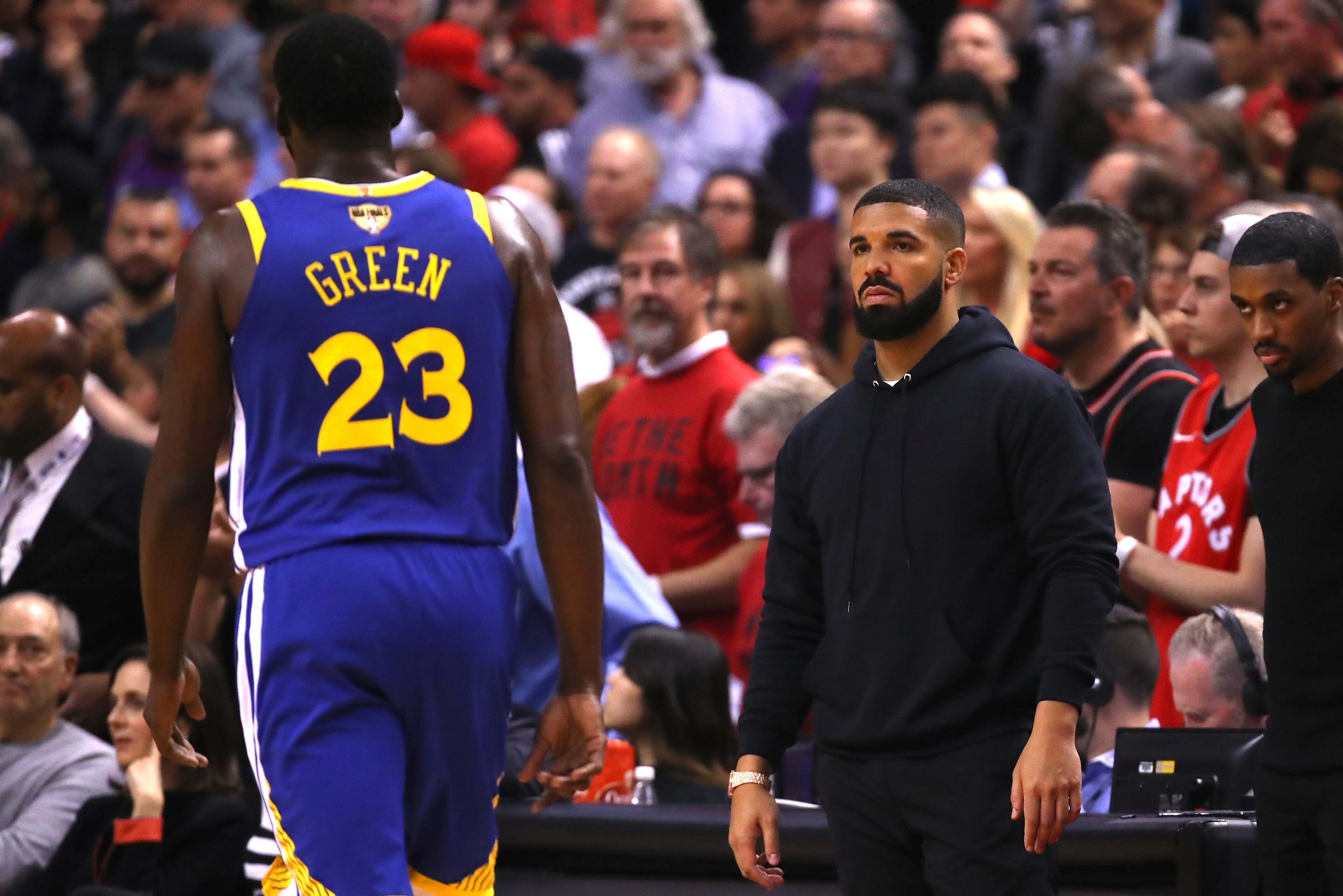 TORONTO, ONTARIO - JUNE 02: Drake reacts in the first half during Game Two of the 2019 NBA Finals between the Golden State Warriors and the Toronto Raptors at Scotiabank Arena on June 02, 2019 in Toronto, Canada.  NOTE TO USER: User expressly acknowledges and agrees that, by downloading and or using this photograph, User is consenting to the terms and conditions of the Getty Images License Agreement. (Photo by Gregory Shamus/Getty Images)
