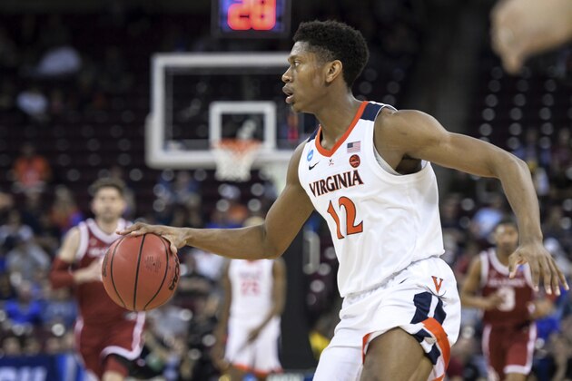 Virginia guard De'Andre Hunter looks to make a play against Oklahoma during the second half of a second-round game in the NCAA men's college basketball tournament Sunday, March 24, 2019, in Columbia, S.C. Virginia defeated Oklahoma 63-51. (AP Photo/Sean Rayford)