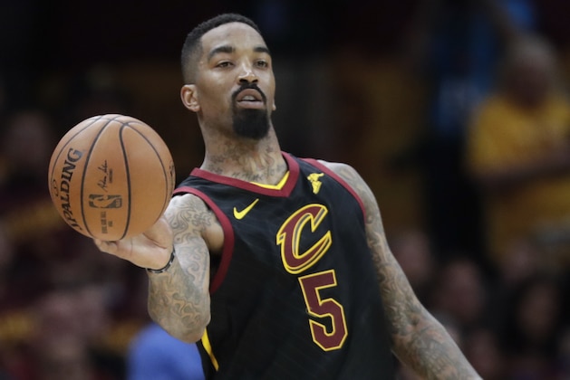Cleveland Cavaliers' JR Smith (5) passes against the Boston Celtics in the second half of Game 4 of the NBA basketball Eastern Conference finals, Monday, May 21, 2018, in Cleveland. (AP Photo/Tony Dejak)