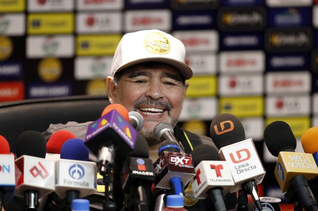 Diego Maradona, head coach of Dorados de Sinaloa soccer team, speaks at a news conference after his team's 4-1 win in a second-tier national league soccer match against Cafetaleros, his first game as coach for Dorados, in Culiacan, Mexico, Monday, Sept. 17, 2018. (AP Photo/Eduardo Verdugo)