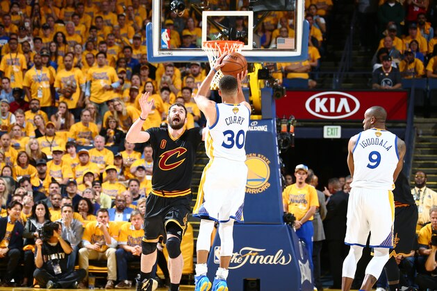 OAKLAND, CA - JUNE 13:  Stephen Curry #30 of the Golden State Warriors shoots against Kevin Love #0 of the Cleveland Cavaliers in Game Five of the 2016 NBA Finals on June 13, 2016 at Oracle Arena in Oakland, California. NOTE TO USER: User expressly acknowledges and agrees that, by downloading and or using this photograph, user is consenting to the terms and conditions of Getty Images License Agreement. Mandatory Copyright Notice: Copyright 2016 NBAE (Photo by Nathaniel S. Butler/NBAE via Getty Images)