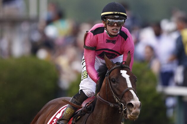 War of Will, ridden by Tyler Gaffalione reacts after crossing the finish line to win the Preakness Stakes horse race at Pimlico Race Course, Saturday, May 18, 2019, in Baltimore. (AP Photo/Patrick Semansky)