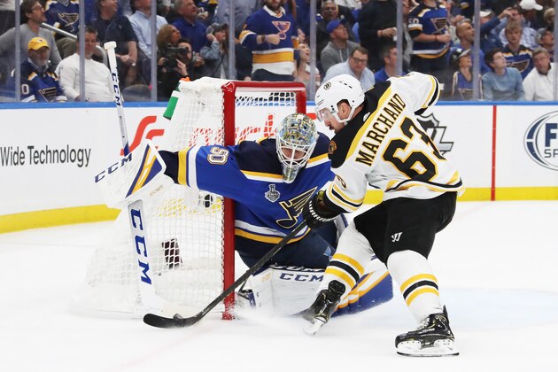 ST LOUIS, MISSOURI - JUNE 03: Jordan Binnington #50 of the St. Louis Blues makes a save against Brad Marchand #63 of the Boston Bruins in Game Four of the 2019 NHL Stanley Cup Final at Enterprise Center on June 03, 2019 in St Louis, Missouri. (Photo by Bruce Bennett/Getty Images)