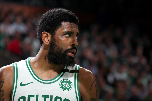 BOSTON, MA - MAY 6: Kyrie Irving #11 of the Boston Celtics looks on against the Milwaukee Bucks during Game Four of the Eastern Conference Semifinals of the 2019 NBA Playoffs on May 6, 2019 at the TD Garden in Boston, Massachusetts. NOTE TO USER: User expressly acknowledges and agrees that, by downloading and/or using this photograph, user is consenting to the terms and conditions of the Getty Images License Agreement. Mandatory Copyright Notice: Copyright 2019 NBAE (Photo by Nathaniel S. Butler/NBAE via Getty Images)