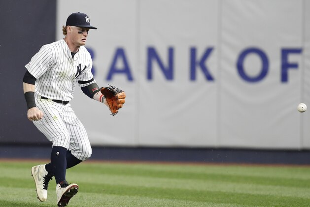 New York Yankees right fielder Clint Frazier goes after Boston Red Sox Michael Chavis's RBI triple as it bounces away from him during the eighth inning of a baseball game, Sunday, June 2, 2019, in New York. (AP Photo/Kathy Willens)