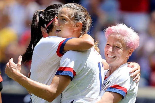 HARRISON, NEW JERSEY - MAY 26:  Tobin Heath #17 of the United States is congratulated by teammates Megan Rapinoe #15 and Alex Morgan #13 after she scored in the first half against Mexico at Red Bull Arena on May 26, 2019 in Harrison, New Jersey. (Photo by Elsa/Getty Images)
