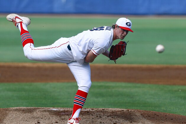 Georgia pitcher Cole Wilcox watches a delivery during the first inning of the team's Southeastern Conference tournament NCAA college baseball game against Arkansas, Thursday, May 23, 2019, in Hoover, Ala. (AP Photo/Butch Dill)