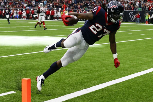 HOUSTON, TX - NOVEMBER 19:  D'Onta Foreman #27 of the Houston Texans runs 34 yards for a touchdown in the fourth quarter against the Arizona Cardinals at NRG Stadium on November 19, 2017 in Houston, Texas. Foreman was injured on the play and was taken off on a cart.  (Photo by Bob Levey/Getty Images)