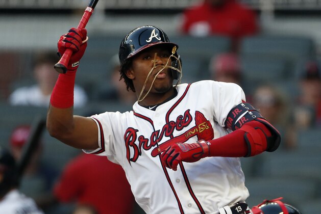 Atlanta Braves left fielder Ronald Acuna Jr. (13) avoids being hit by a pitch from Washington Nationals starting pitcher Stephen Strasburg during a baseball game Tuesday, May 28, 2019, in Atlanta. (AP Photo/John Bazemore)