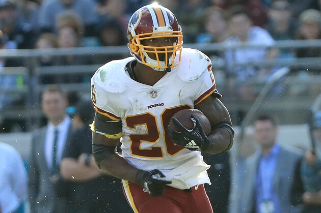 JACKSONVILLE, FLORIDA - DECEMBER 16: Adrian Peterson #26 of the Washington Redskins runs for yardage during the game against the Jacksonville Jaguars at TIAA Bank Field on December 16, 2018 in Jacksonville, Florida. (Photo by Sam Greenwood/Getty Images)