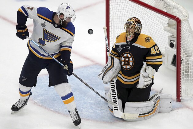 St. Louis Blues' Pat Maroon, left, handles the puck but cannot score past Boston Bruins goaltender Tuukka Rask, of Finland, during the second period in Game 2 of the NHL hockey Stanley Cup Final, Wednesday, May 29, 2019, in Boston. (AP Photo/Charles Krupa)