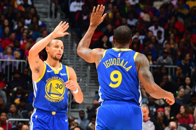 ATLANTA, GA - DECEMBER 3: Stephen Curry #30 and Andre Iguodala #9 of the Golden State Warriors celebrates during the game against the Atlanta Hawks on December 3, 2018 at State Farm Arena in Atlanta, Georgia.  NOTE TO USER: User expressly acknowledges and agrees that, by downloading and/or using this Photograph, user is consenting to the terms and conditions of the Getty Images License Agreement. Mandatory Copyright Notice: Copyright 2018 NBAE (Photo by Scott Cunningham/NBAE via Getty Images)