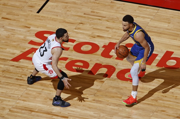 TORONTO, CANADA - JUNE 02: Fred VanVleet #23 of the Toronto Raptors guards Stephen Curry #30 of the Golden State Warriors during Game Two of the NBA Finals on June 2, 2019 at Scotiabank Arena in Toronto, Ontario, Canada. NOTE TO USER: User expressly acknowledges and agrees that, by downloading and/or using this photograph, user is consenting to the terms and conditions of the Getty Images License Agreement. Mandatory Copyright Notice: Copyright 2019 NBAE (Photo by Mark Blinch/NBAE via Getty Images)