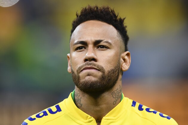 Brazil's Neymar warms up before a friendly football match against Qatar at the Mane Garrincha stadium in Brasilia on June 5, 2019, ahead of Brazil 2019 Copa America. (Photo by EVARISTO SA / AFP)        (Photo credit should read EVARISTO SA/AFP/Getty Images)