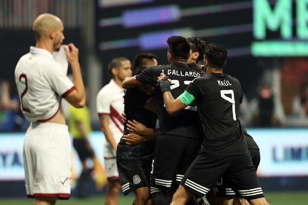 ATLANTA, GA - JUNE 05: Roberto Alvarado of Mexico celebrates with teammates after scoring the equalizer during the international friendly match between Mexico and Venezuela at Mercedes-Benz Stadium on June 5, 2019 in Atlanta, Georgia. (Photo by Omar Vega/Getty Images)