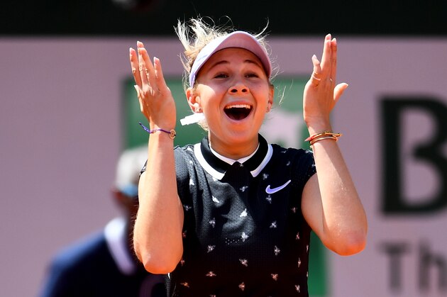 PARIS, FRANCE - JUNE 06: Amanda Anisimova of The United States celebrates victory during her ladies singles quarter-final match against Simona Halep of Romania during Day twelve of the 2019 French Open at Roland Garros on June 06, 2019 in Paris, France. (Photo by Clive Mason/Getty Images)