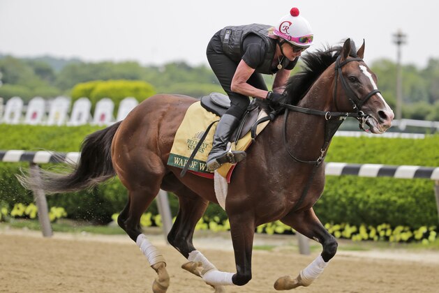 Exercise rider Kim Carroll rides War of Will during a workout at Belmont Park in Elmont, N.Y., Wednesday, June 5, 2019. The 151st Belmont Stakes horse race will be run on Saturday, June 8, 2019. (AP Photo/Seth Wenig)