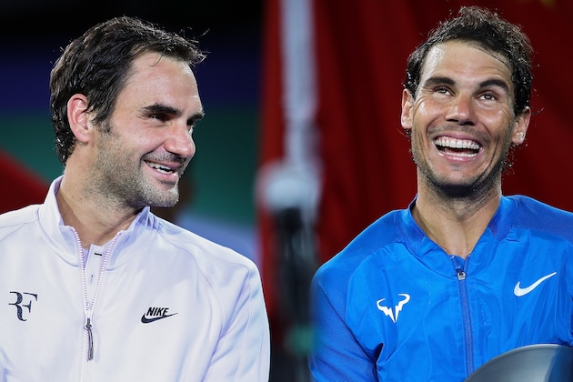 SHANGHAI, CHINA - OCTOBER 15:  Roger Federer of Switzerland talk with Rafael Nadal of Spain during the award ceremony after the Men's singles final mach on day eight of 2017 ATP Shanghai Rolex Masters at Qizhong Stadium on October 15, 2017 in Shanghai, China.  (Photo by Lintao Zhang/Getty Images)