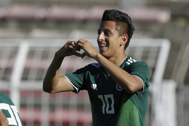 Mexico's Roberto Carlos Alvarado Hernandez, celebrates after scoring during the Under-21 Toulon soccer tournament final match, between England and Mexico, in Martigues, southern France, Saturday, June 9, 2018. (AP Photo/Claude Paris)