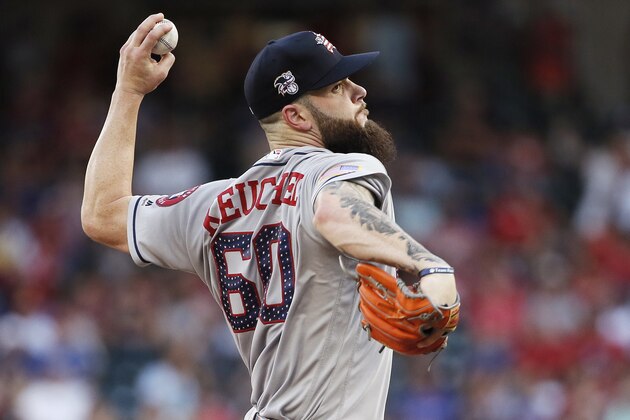 Houston Astros starting pitcher Dallas Keuchel (60) throws during the first inning of a baseball game against the Texas Rangers, Tuesday, July 3, 2018, in Arlington, Texas. (AP Photo/Brandon Wade)