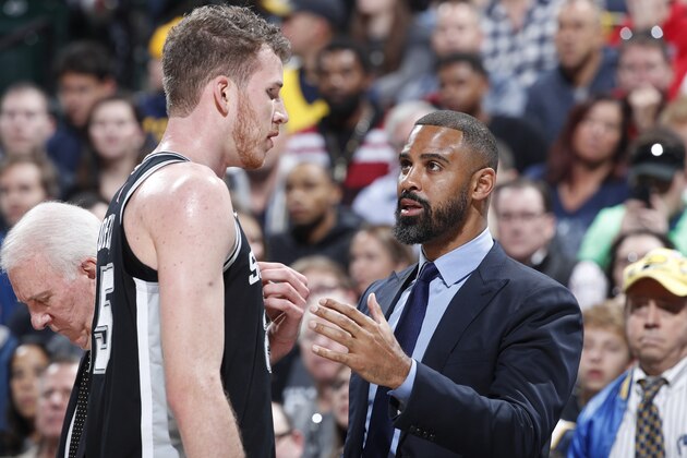INDIANAPOLIS, IN - NOVEMBER 23: Assistant coach Ime Udoka of the San Antonio Spurs talks to Jakob Poeltl #25 during the game against the Indiana Pacers at Bankers Life Fieldhouse on November 23, 2018 in Indianapolis, Indiana. NOTE TO USER: User expressly acknowledges and agrees that, by downloading and or using the photograph, User is consenting to the terms and conditions of the Getty Images License Agreement. (Photo by Joe Robbins/Getty Images)